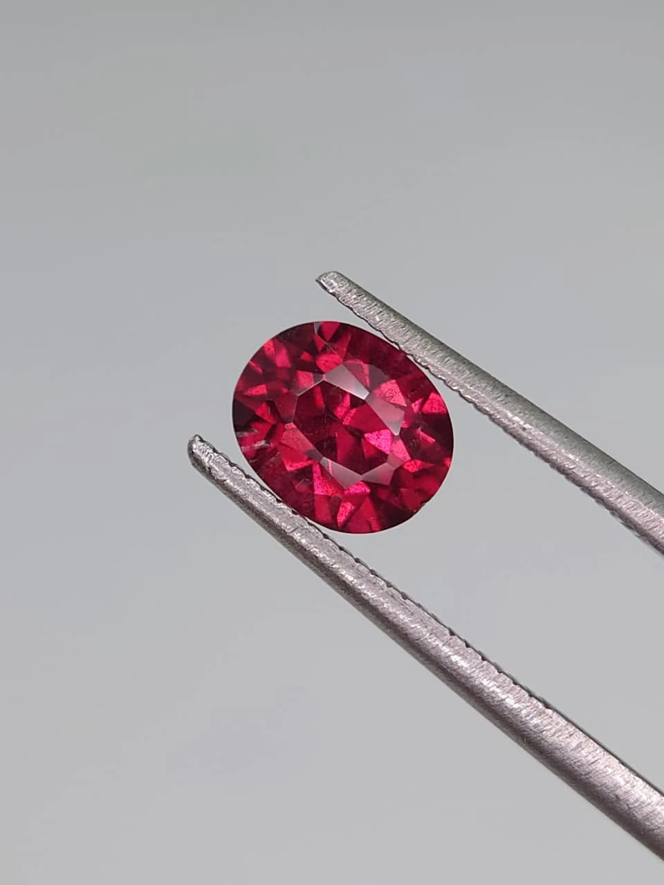 1.37ct Natural Oval Faceted Malaya Garnet from Tanzania — view 3